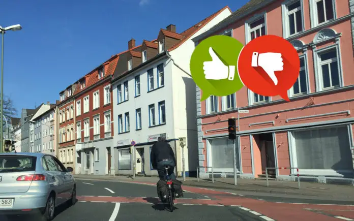 Radfahrer in der Mitte der Straße